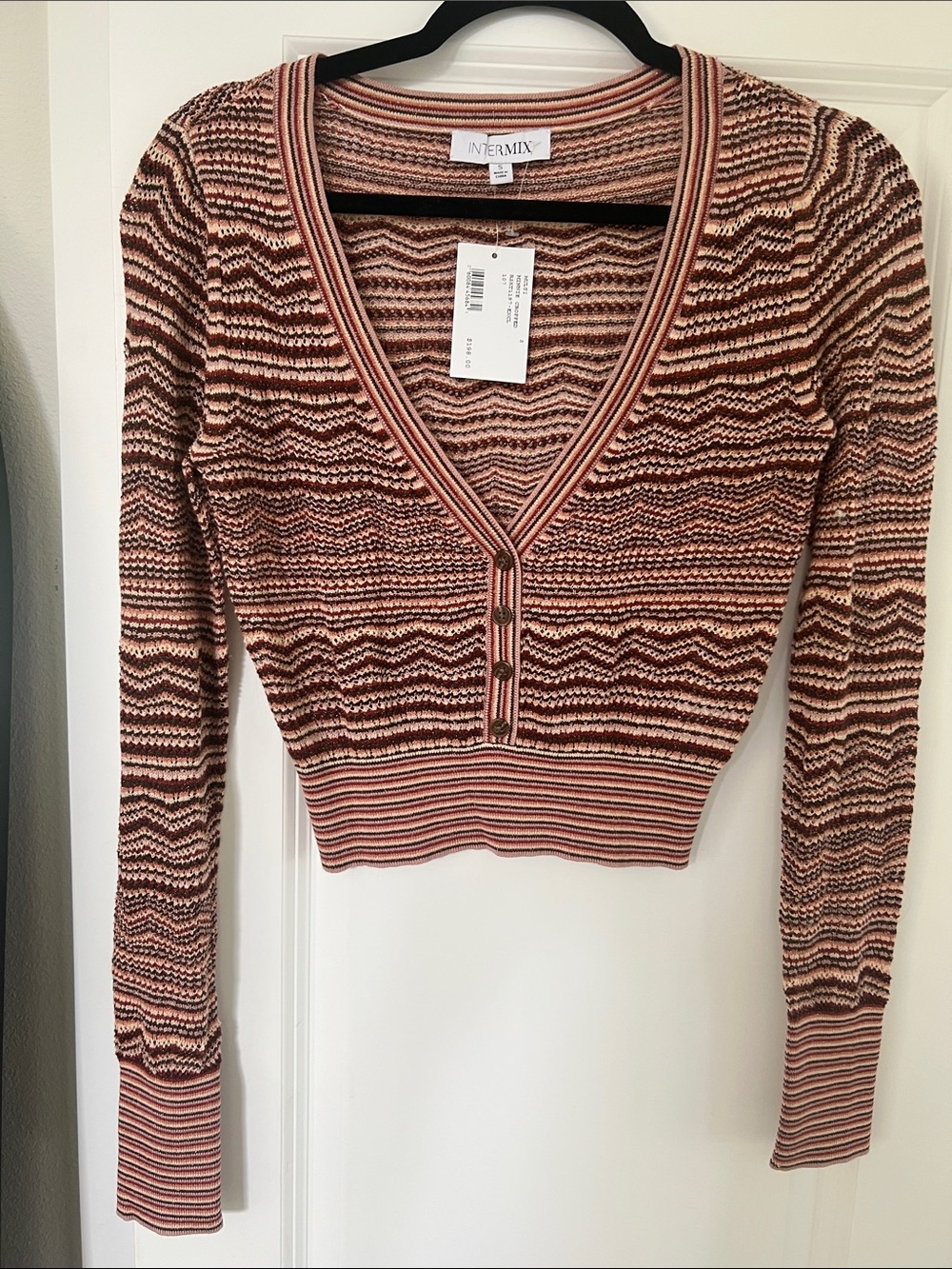 INTERMIX Striped V-Neck Crop Knit Top in rust and mauve.
